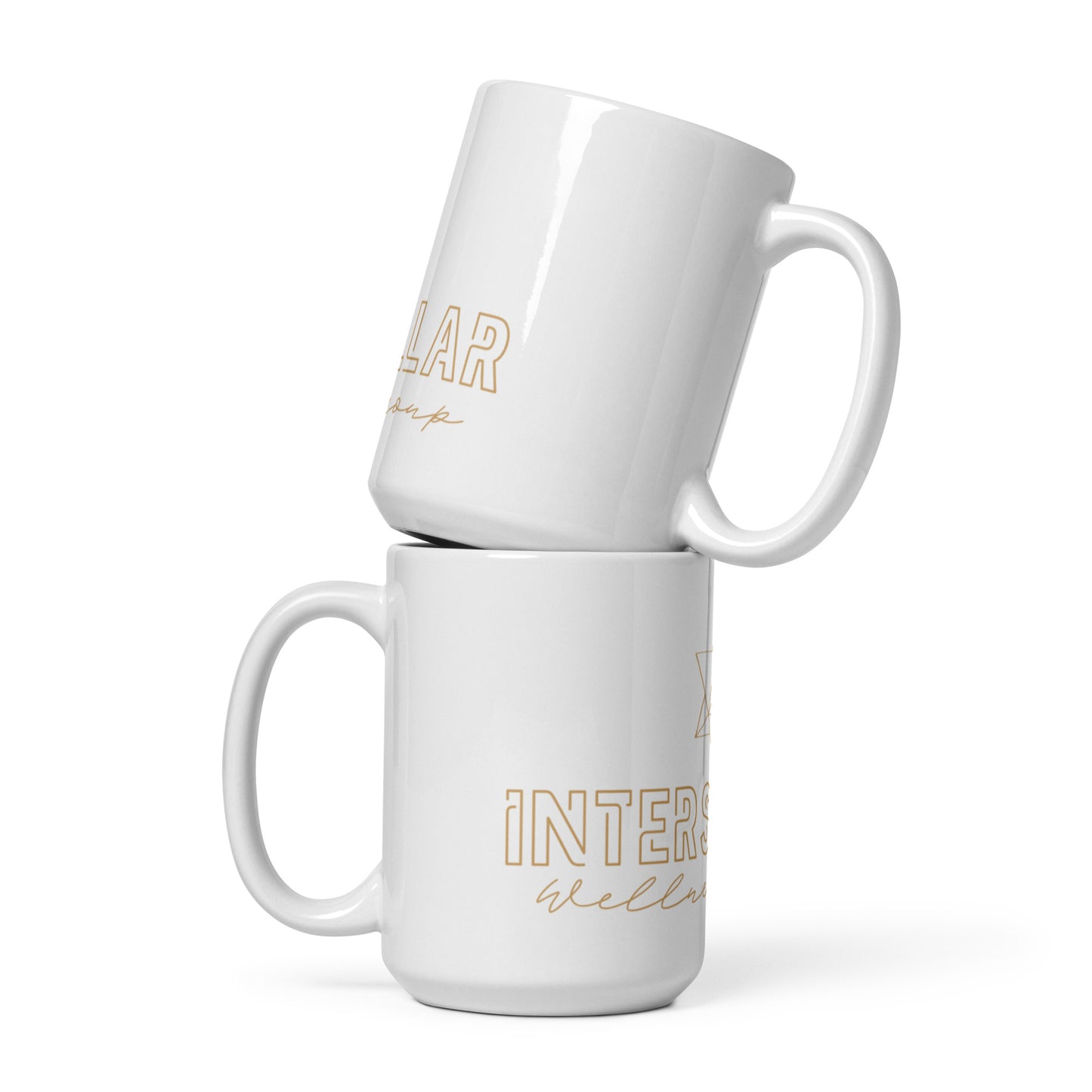 Two white mugs with gold text stacked on a white background